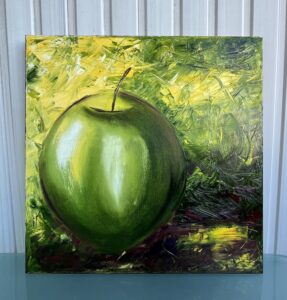 Green apple oil canvas art in studio